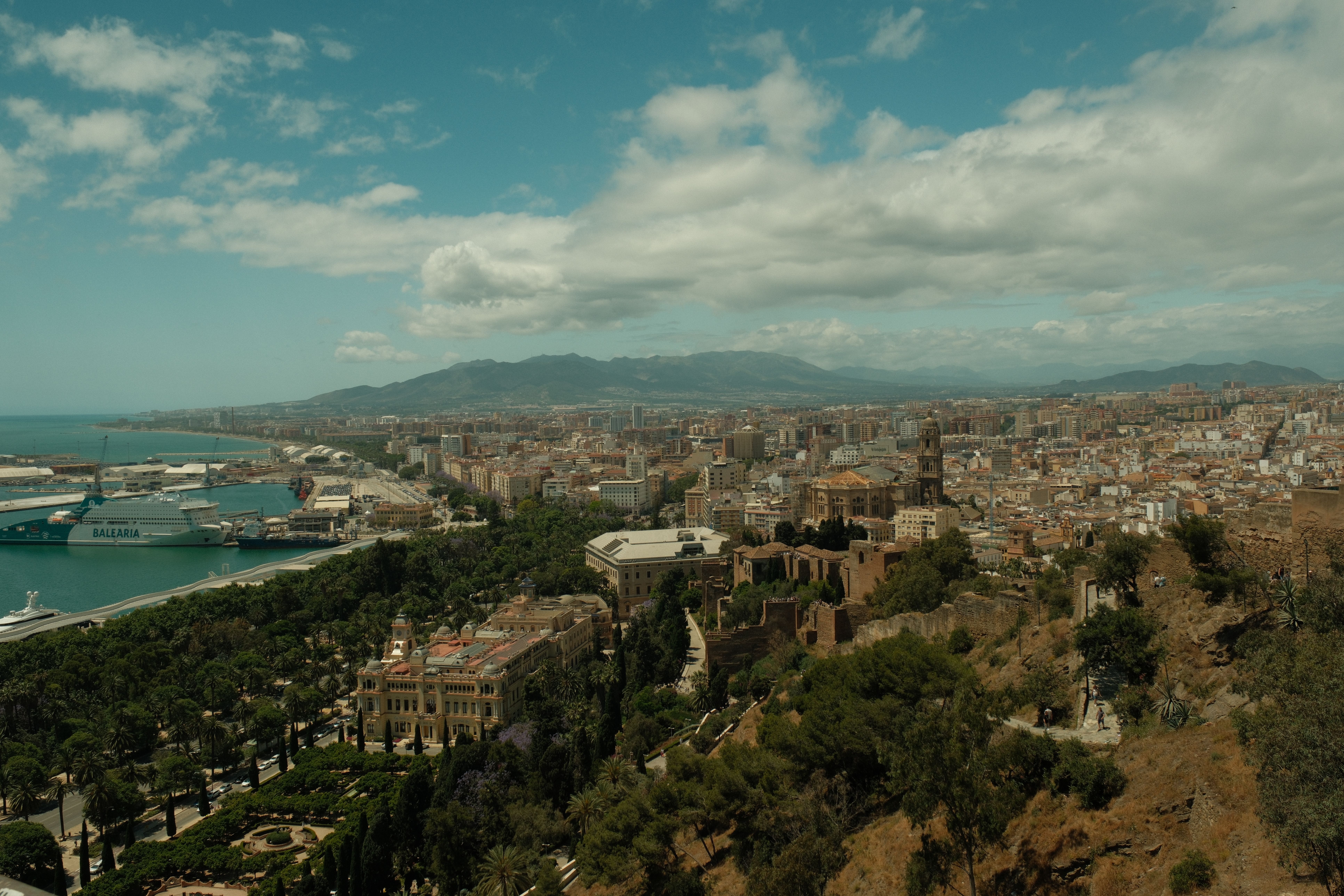 Aerial view of Málaga city, harbor, and coastline in Andalucía, Spain